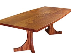 Custom face grain Jatoba contemporary trestle-style table.