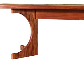 Custom face grain Jatoba contemporary trestle-style table.