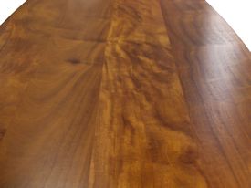 Custom face grain Jatoba contemporary trestle-style table.