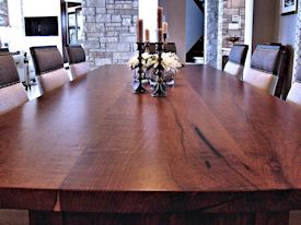 Custom face grain mesquite mission style dining table with through mortise and tenon jointery.