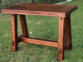 Custom distressed walnut a-frame trestle style bathroom vanity table.