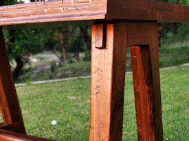 Custom distressed walnut a-frame trestle style bathroom vanity table.