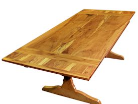 Custom trestle style dining table with self-storing leaves.  Made from spalted pecan with bread board ends and mortise and tenon jointery.