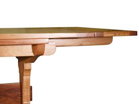 Custom trestle style dining table with self-storing leaves.  Made from spalted pecan with bread board ends and mortise and tenon jointery.