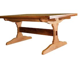 Custom trestle style dining table with self-storing leaves.  Made from spalted pecan with bread board ends and mortise and tenon jointery.