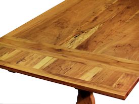 Custom trestle style dining table with self-storing leaves.  Made from spalted pecan with bread board ends and mortise and tenon jointery.