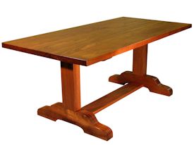 Custom Jatoba trestle style dining table with mortise and tenon jointery.