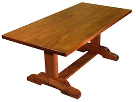 Custom Jatoba trestle style dining table with mortise and tenon jointery.