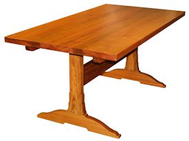 Custom face grain Jatoba trestle-style table with mortise and tenon jointery.