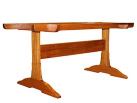 Custom face grain Jatoba trestle-style table with mortise and tenon jointery.