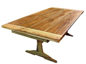 Custom spalted pecan trestle-style table with self storing leaves.  Face grain construction with bread board ends.