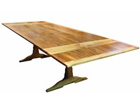 Custom spalted pecan trestle-style table with self storing leaves.  Face grain construction with bread board ends.