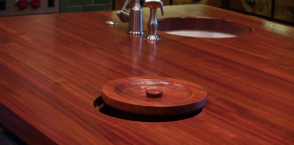 Jatoba Wood Island Countertop with Integrated Trash Hole and Hand Carved Trash Lid
