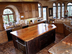 Spalted Pecan book matched slab wood island top with Natural Edges and an integrated Spalted Pecan Sink.  Waterlox Satin finish.