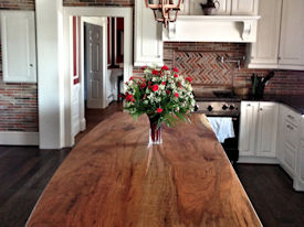 Spalted Pecan slab wood island top with Waterlox Satin finish.