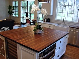 Walnut edge grain wood island countertop.