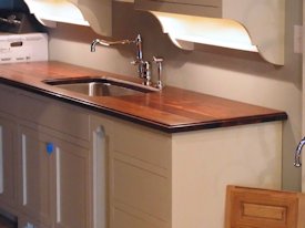 Walnut face grain wood countertop.