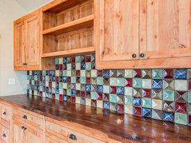 Rustic Walnut face grain countertop with Turquoise Fills and Waterlox Satin finish.