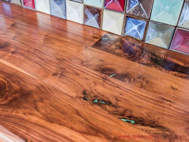 Rustic Walnut face grain countertop with Turquoise Fills and Waterlox Satin finish.
