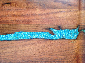 Rustic Walnut face grain countertop with Turquoise Fills and Waterlox Satin finish.