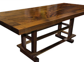 Custom Banquette Table.  Constructed using Slab Guanacaste with a Face Grain Walnut Band and a Custom Walnut Table Base.  Waterlox Satin Finish.