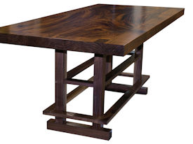 Custom Banquette Table.  Constructed using Slab Guanacaste with a Face Grain Walnut Band and a Custom Walnut Table Base.  Waterlox Satin Finish.