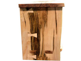 Custom Entertainment Center made from Ambrosia Maple Slabs.  Natural Edges on Face.  Mortise and Tenon Jointery.  Maple Butterfly Detailing.  Adjustable Shelves.  Cord Cutouts.  Tung Oil Citrus Finish.
