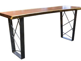 Custom bar table using a Guanacaste Slab Top with Natural Edges and a Waterlox Satin finish.  Custom polished cold rolled steel table base with clear lacquer finish.