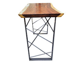 Custom bar table using a Guanacaste Slab Top with Natural Edges and a Waterlox Satin finish.  Custom polished cold rolled steel table base with clear lacquer finish.