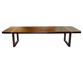 Custom dining table using book-matched walnut slabs with a drop edge for the top.  Custom steel base and accent bands with a hand rubbed (bronze) finish.