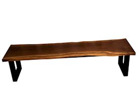 Custom bench using walnut slab and a custom flat black metal base.