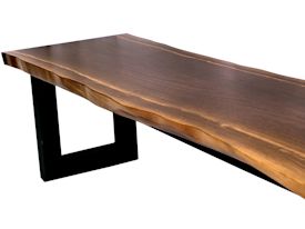 Custom bench using walnut slab and a custom flat black metal base.