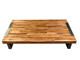 Custom edge grain coffee table using juvenile teak with a brushed stainless metal base. 