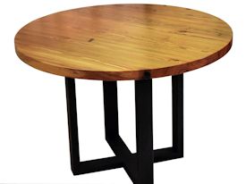 Custom bar table using a face grain reclaimed longleaf pine top and a custom flat black metal base. 