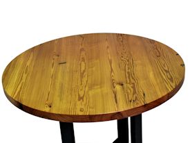 Custom bar table using a face grain reclaimed longleaf pine top and a custom flat black metal base. 