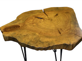 Custom Pecan Button Slab Table with Waterlox Satin Finish and metal base.