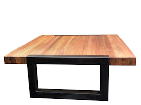 Custom edge grain teak coffee table with a flat black metal base. 