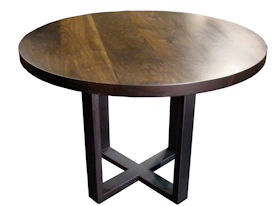 Custom bar table using a face grain walnut top and a custom flat black metal base. 