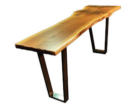 Custom Walnut Bookmatched Slab Table with Natural Edges, a Waterlox Finish and a flat black metal base. 