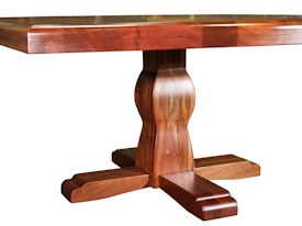 Custom jatoba table with pedestal-style base and drop-edge top.