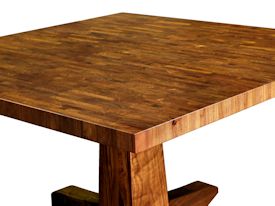 Custom table with walnut pedestal-style base and mesquite end-grain top