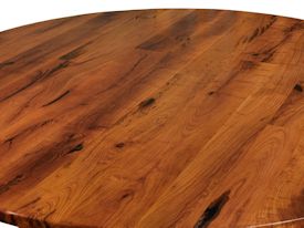 Custom face grain mesquite table top with pedestal-style base using a live oak stump.