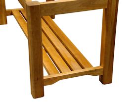 Custom walnut butcher block chopping table with cherry base.  this table uses mortise and tenon jointery and has a slat-style shelf.  The top is constructed using 1-3/4 inch square blocks and is 5 inches thick.  It has a softened edge and is finished with Tung Oil/Citrus Solvent.  Custom Crafted for Ramindesign LLC.