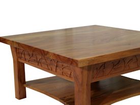 Custom Spalted Pecan square coffee table with custom designed carved aprons and shaped shelf.
