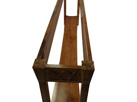 Custom Spalted Pecan sofa table with custom designed carved aprons and shaped shelf.
