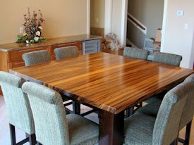 Custom Zebrawood table with a solid Wenge base.  This table also has two large leaves that are not shown.