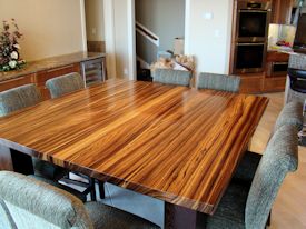 Custom Zebrawood table with a solid Wenge base.  This table also has two large leaves that are not shown.