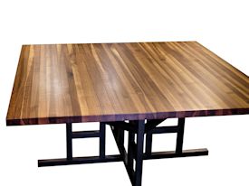 Custom dining table using edge grain walnut top and a custom wenge base with ICA finish. 