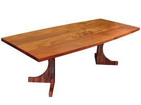 Custom face grain Jatoba contemporary trestle-style table.