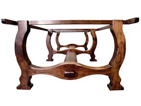 Custom distressed face grain Walnut trestle-style conference table with Wenge accents.  Pop-up electrical grommet access.  Through mortise and tenon jointery.